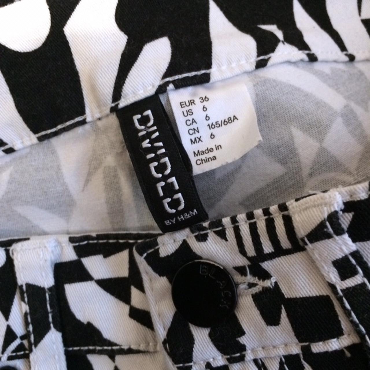 Low rise skinny jeans with abstract black and white... Depop