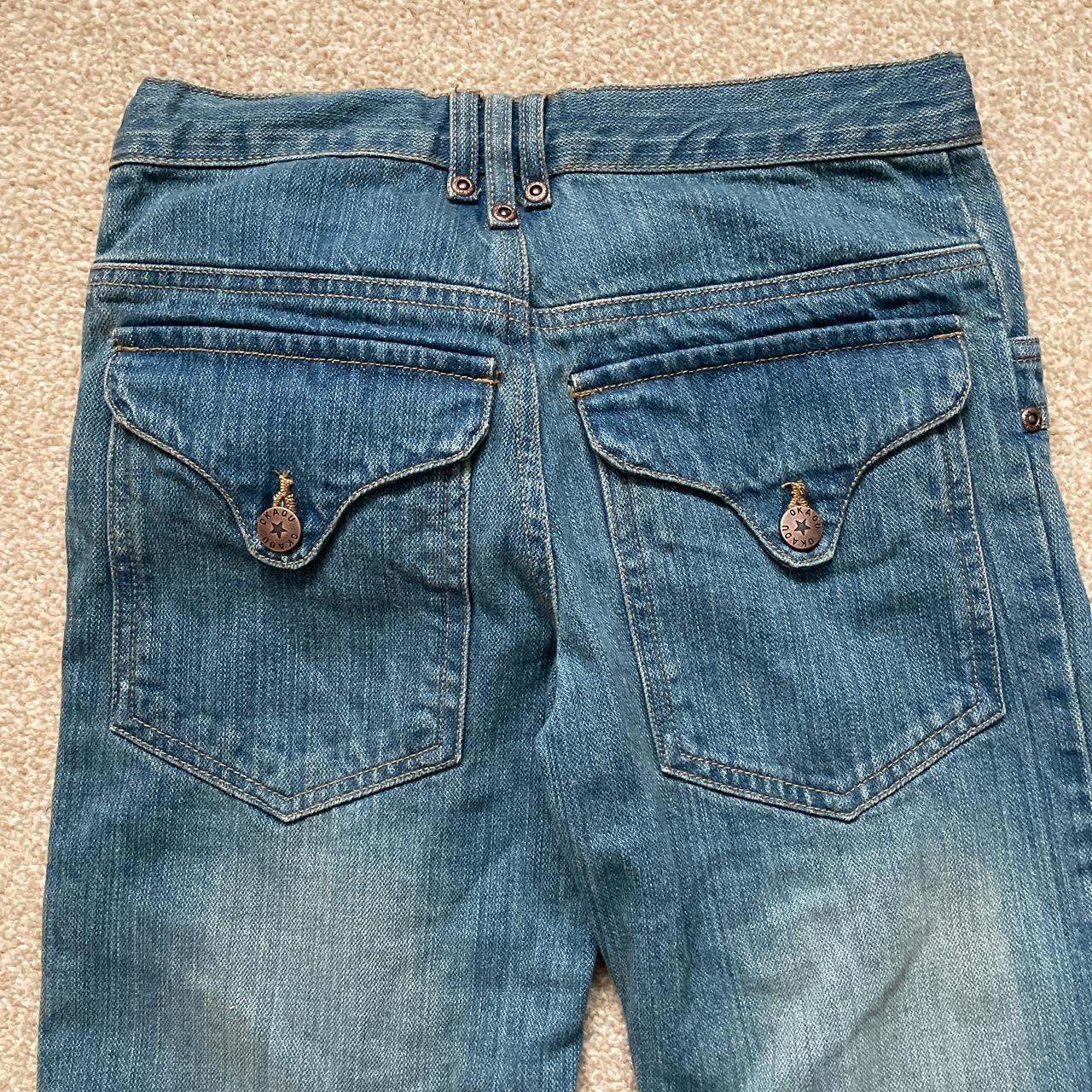 Jeans embroidered with button up pockets. Says child... - Depop