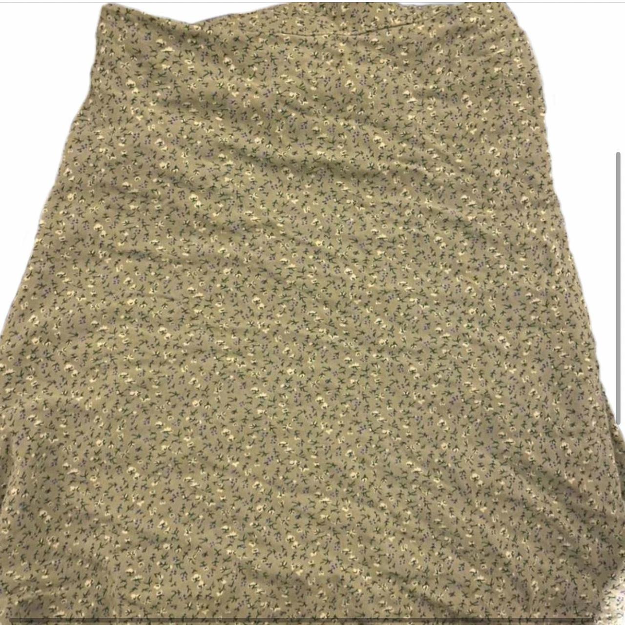 Brandy Melville wrap skirt Floral Fits size... - Depop