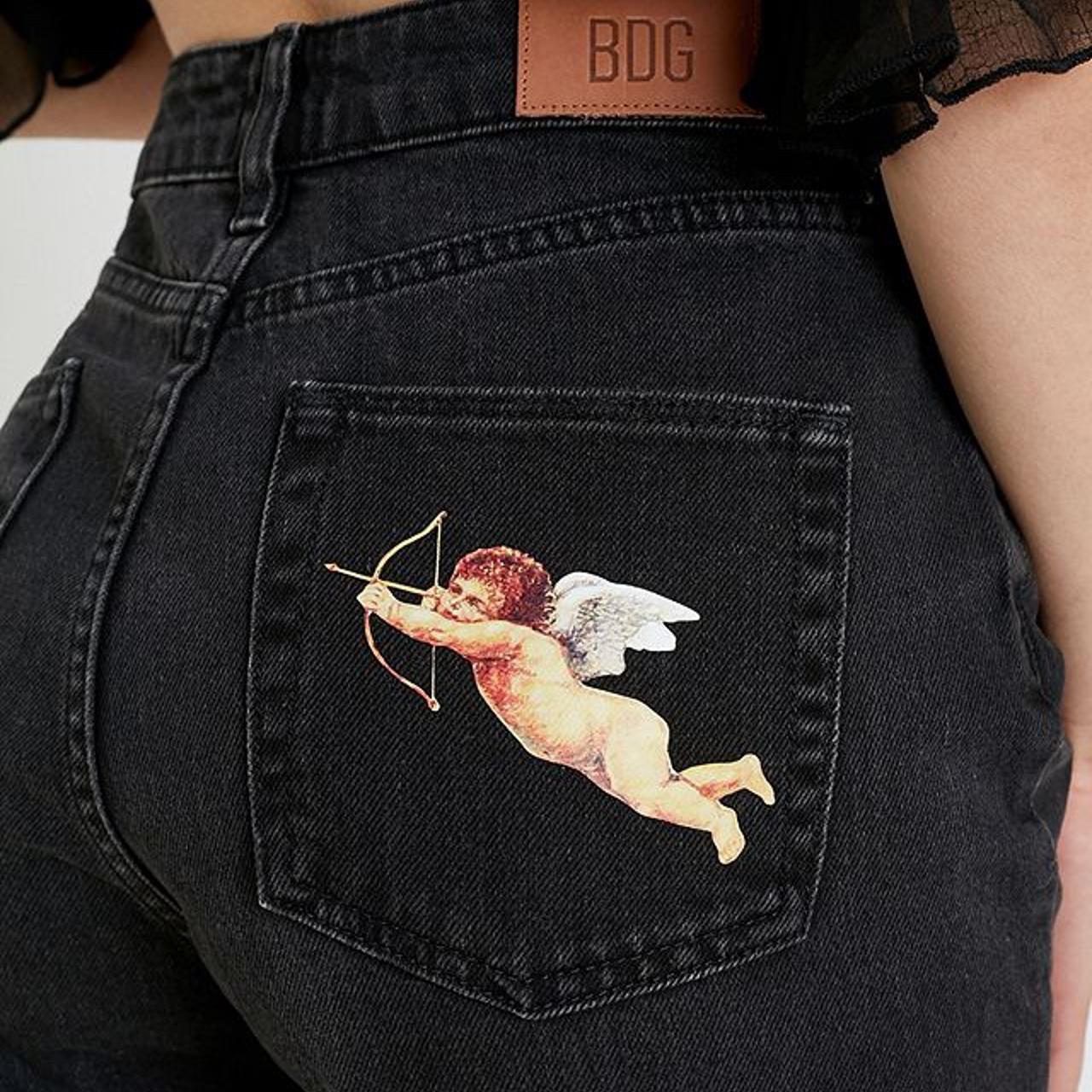 Jeans with angel wings on hot sale the back