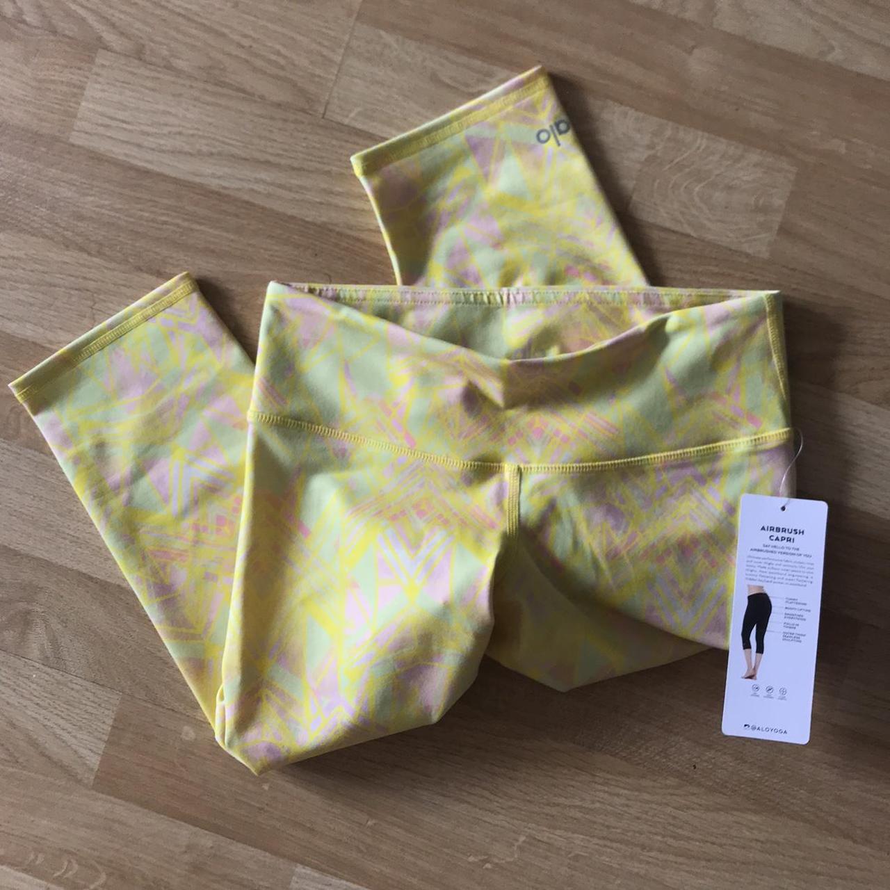 Bright yellow patterned Alo Yoga capri leggings size... Depop