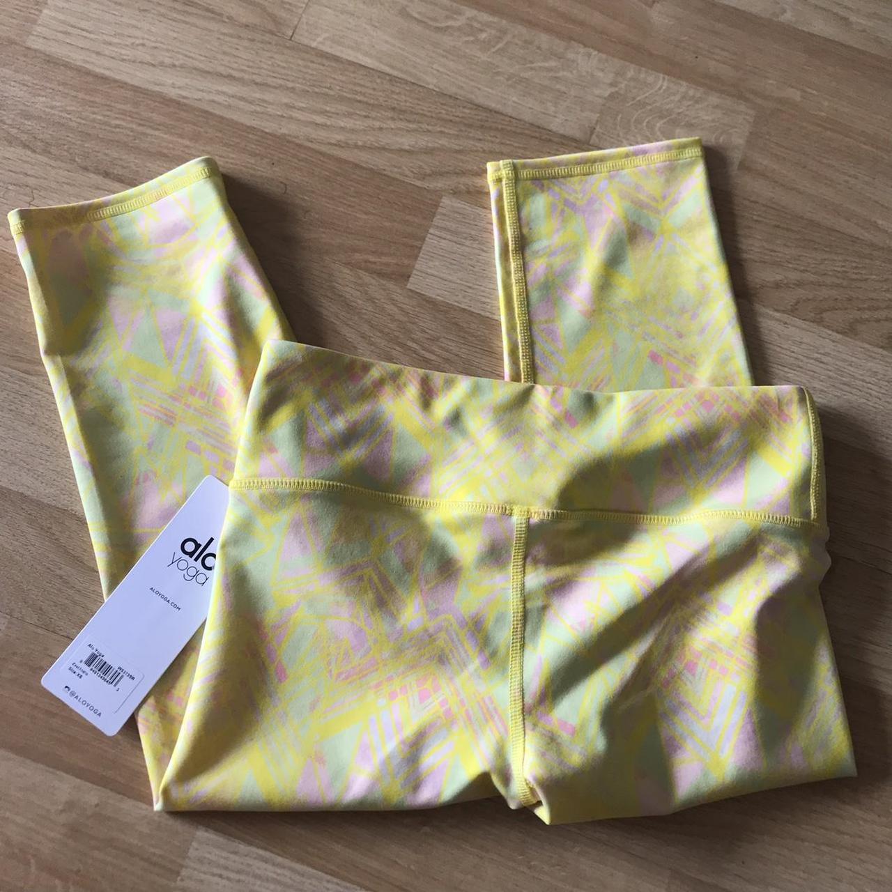Bright yellow patterned Alo Yoga capri leggings size... Depop