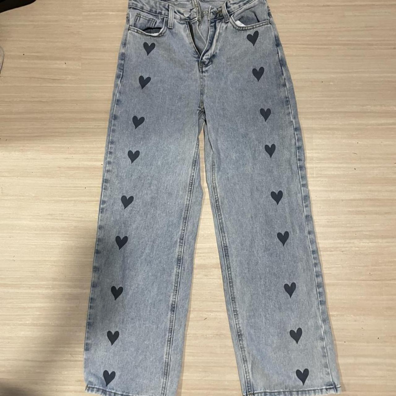 cutest light wash jeans with heart details bought... - Depop