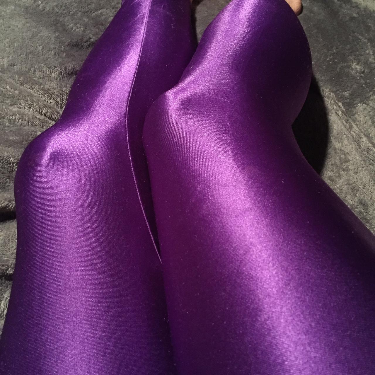 Super shiny and smooth vintage 80s purple leggings.