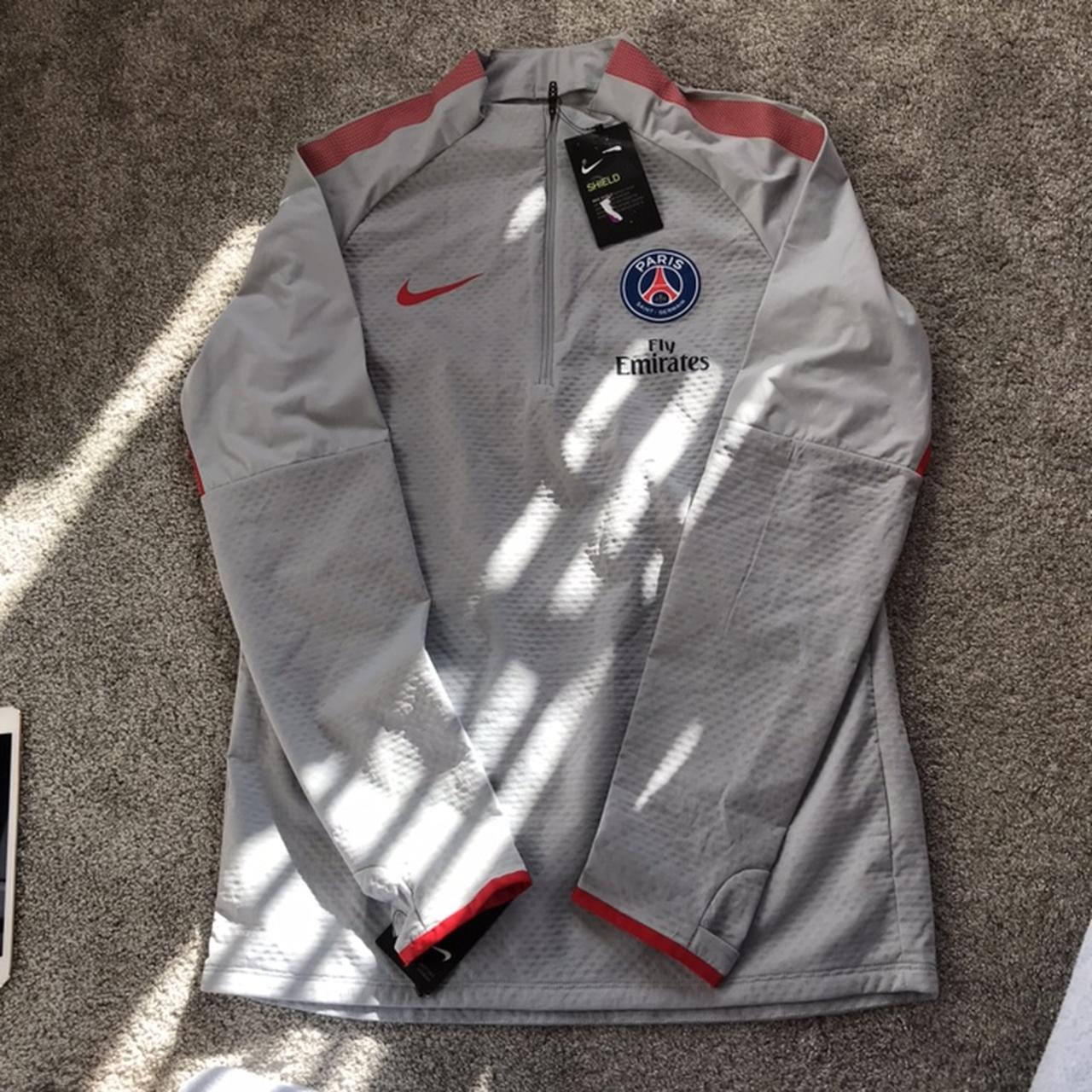 nike shield strike drill top