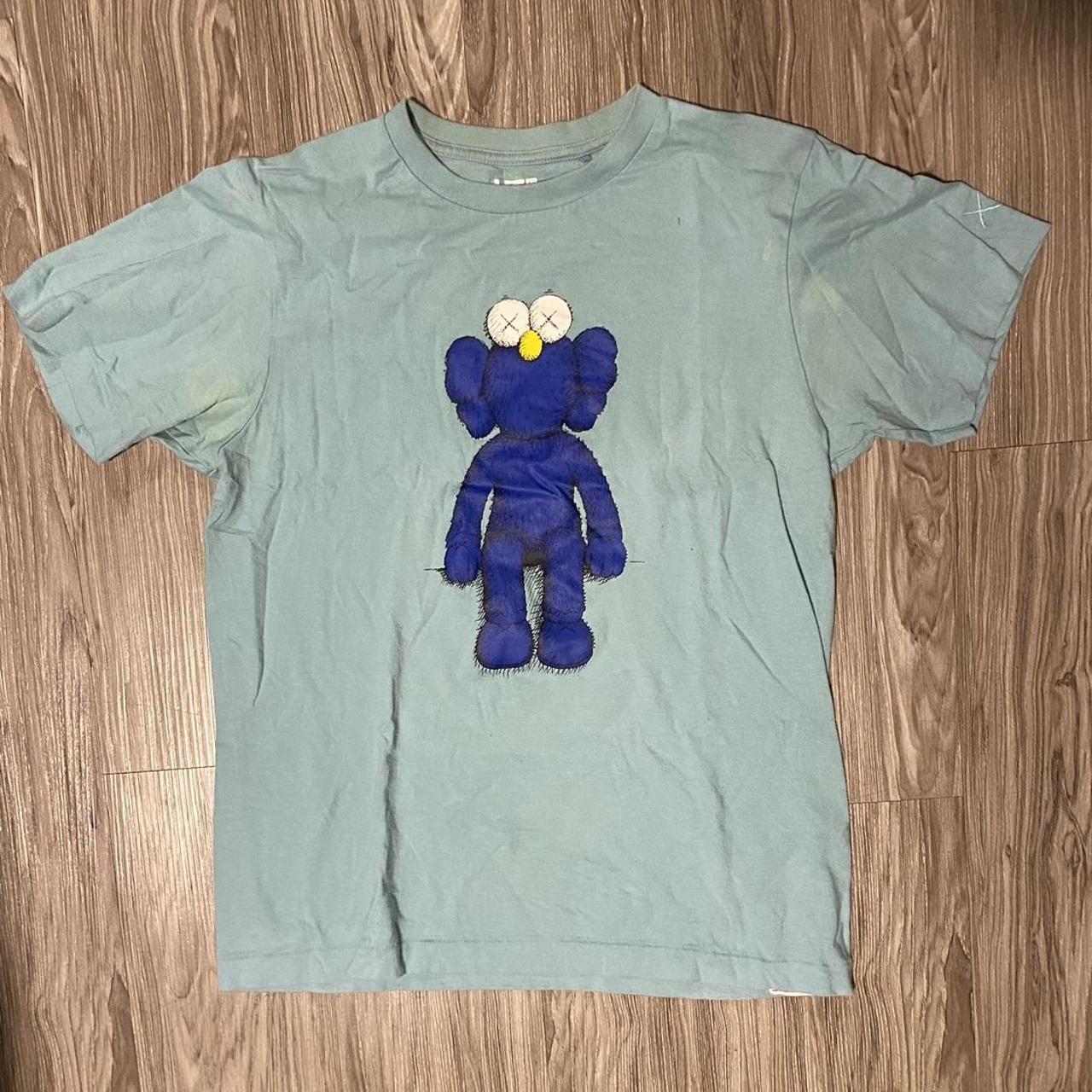 Kaws x Uniqlo blue shirt Size XS in men can fit a... - Depop