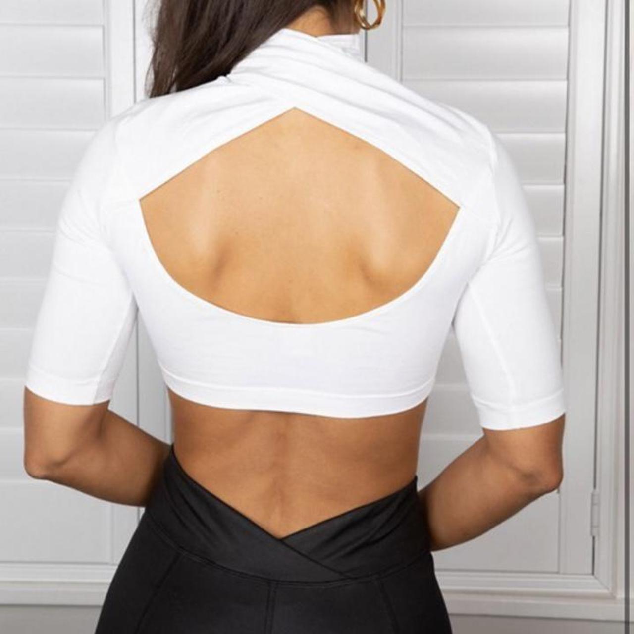 Puma x Stef Fit crop top with open back in off... | Depop