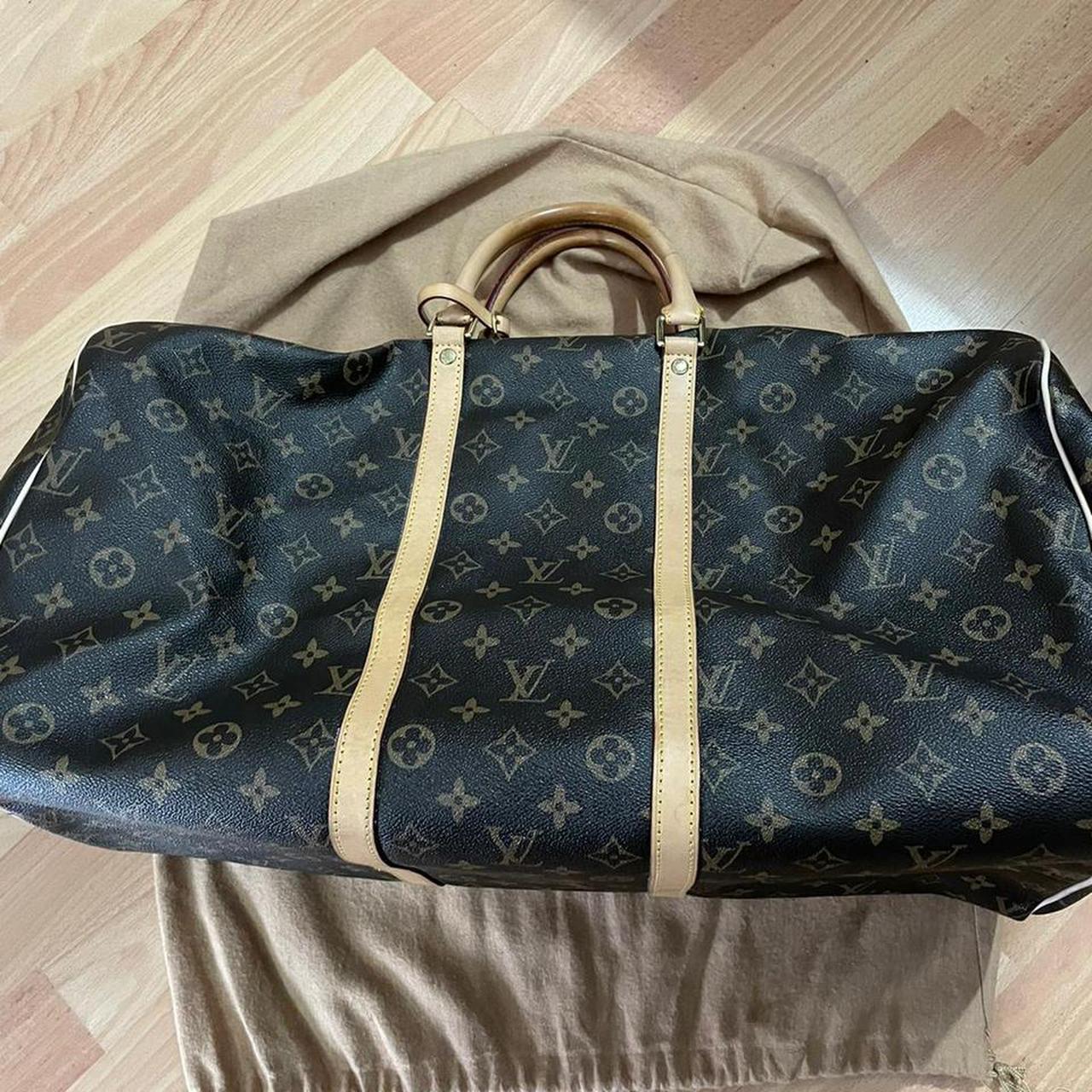 A Louis Vuitton Duffle bag. Used but in very good - Depop