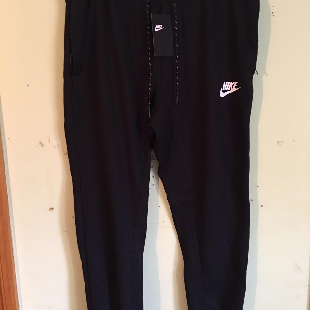 nike skinny track bottoms
