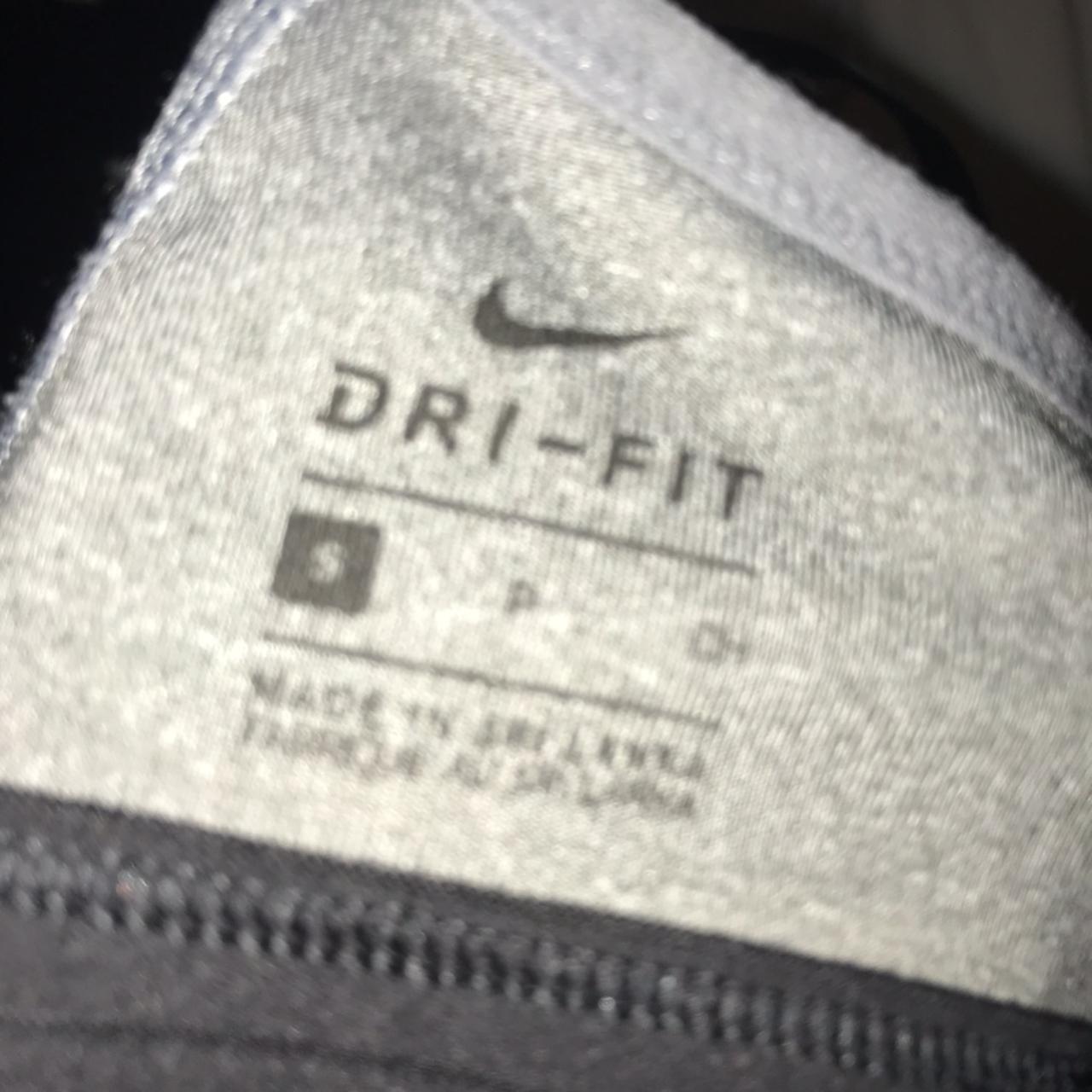 Grey Nike sports bra, size Small, selling because to... - Depop