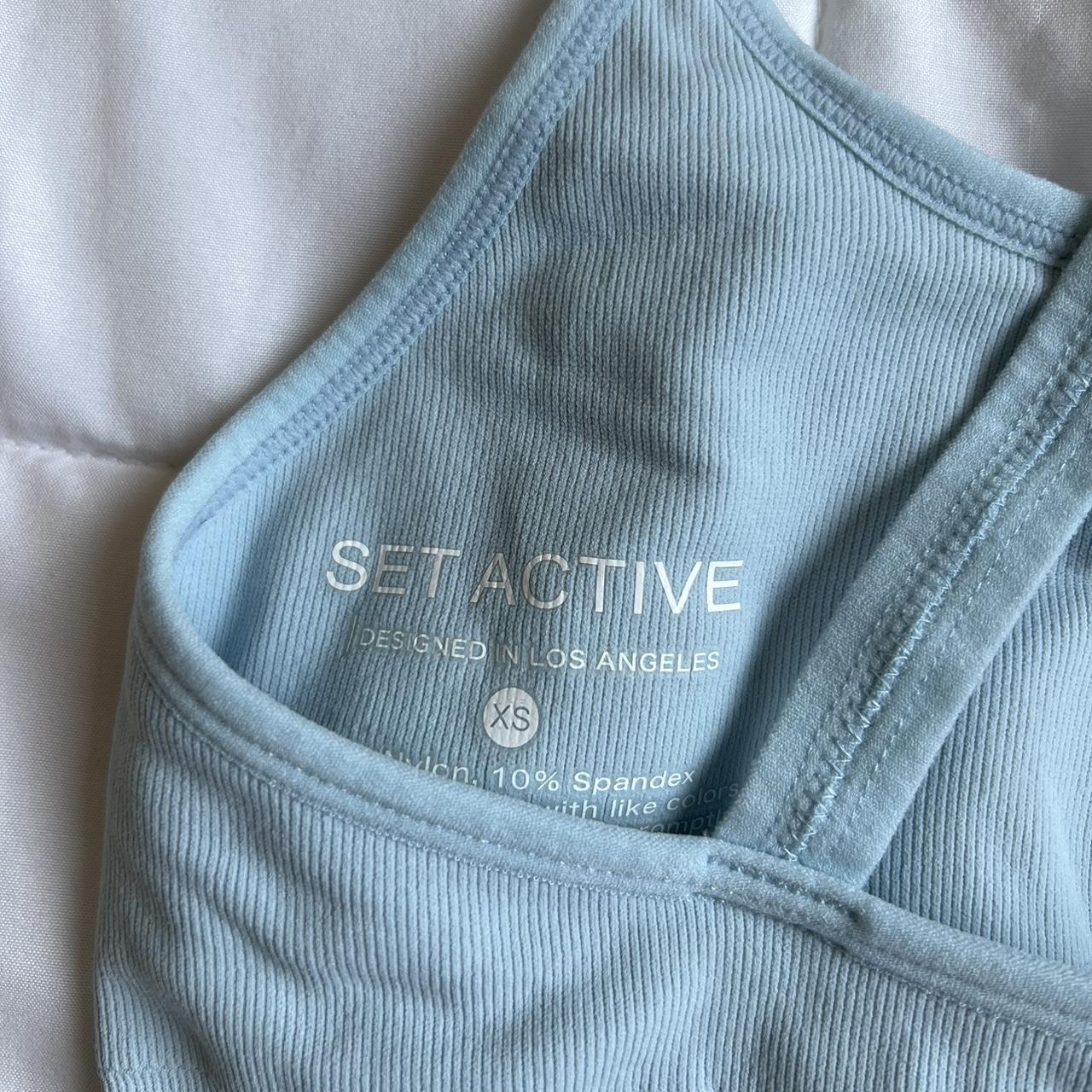 set active box x sports bra in the color ace size... Depop