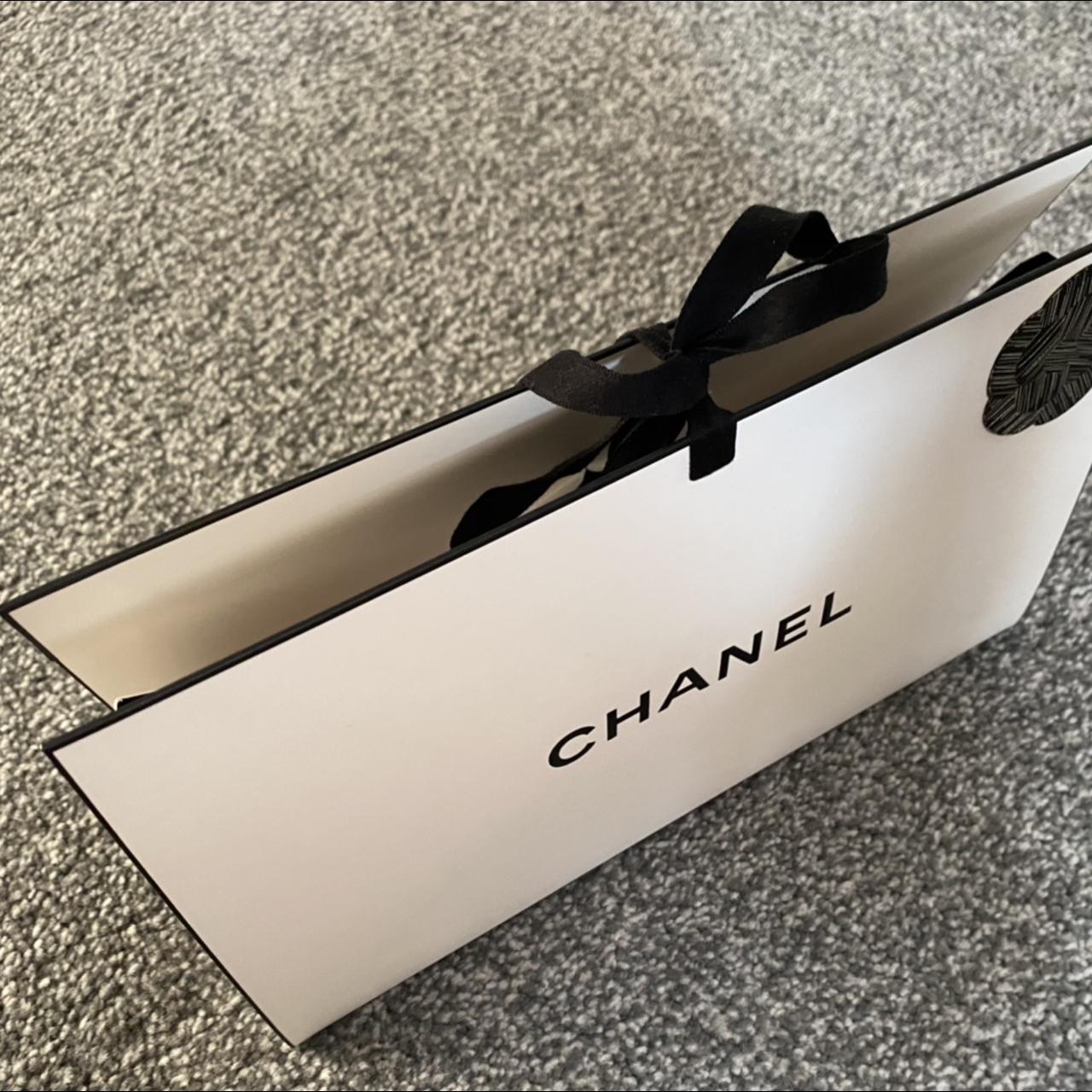 authentic chanel white paper bag with one of the - Depop