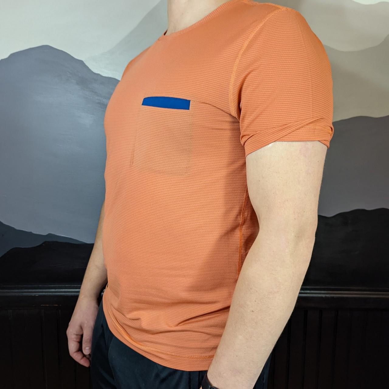 salmon colored shirt