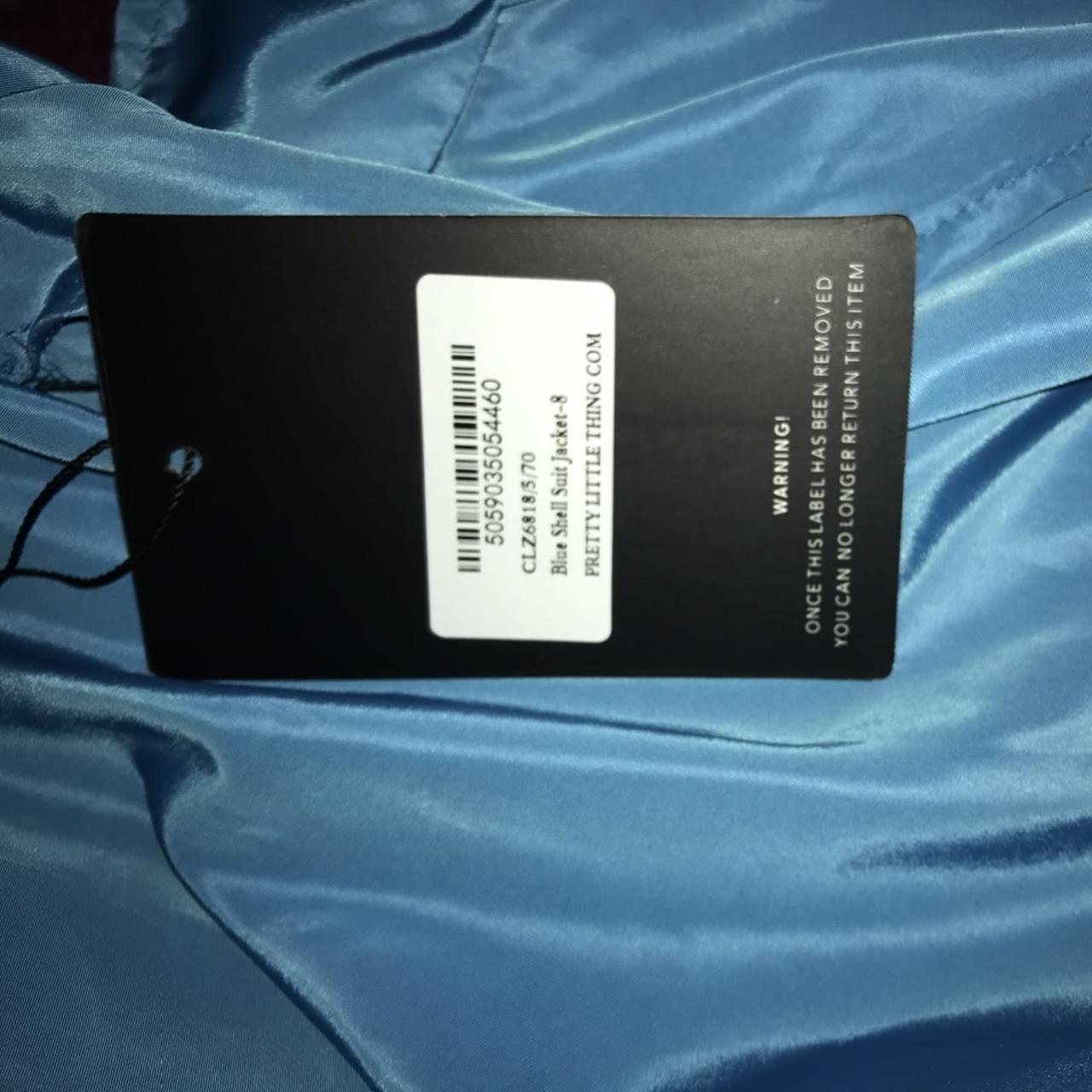 Blue shell suit jacket Size uk New with