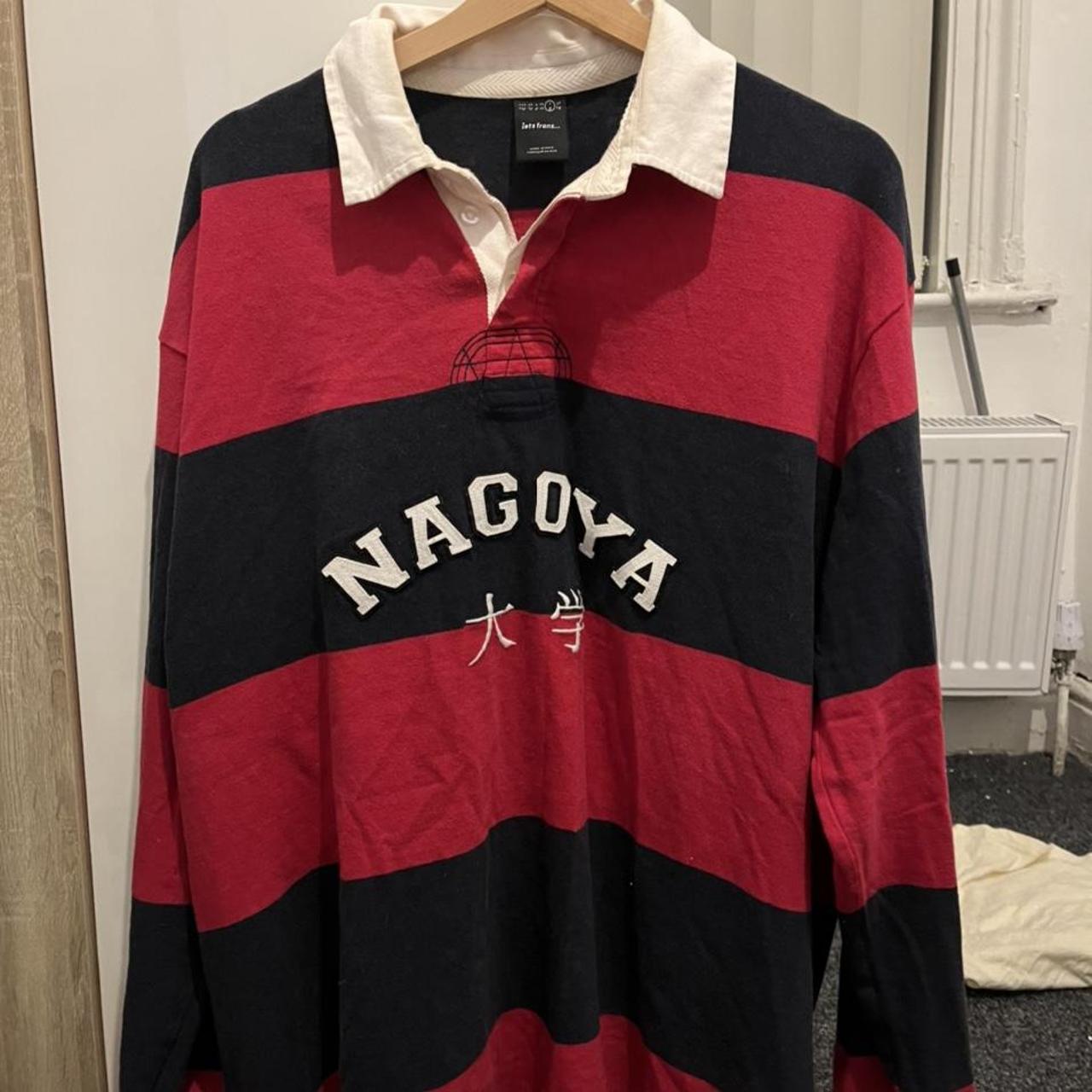 Rugby style shirt with Nagoya print on the front... Depop