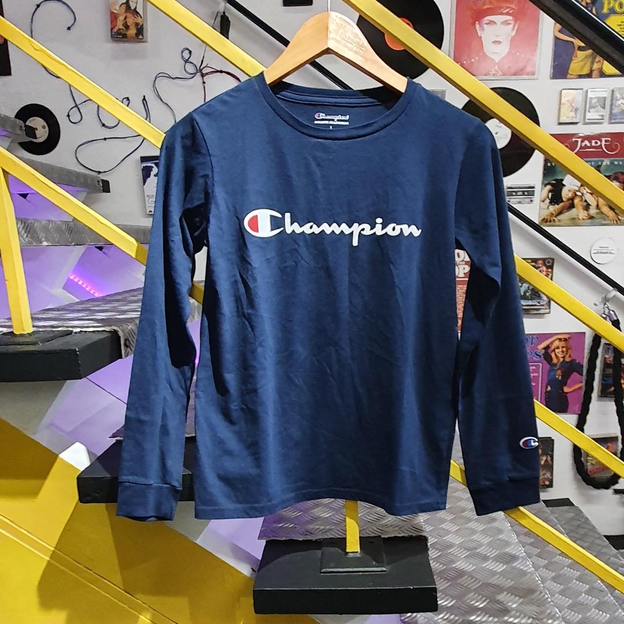 Champion long sleeve T shirt Navy youth L comes up. Depop