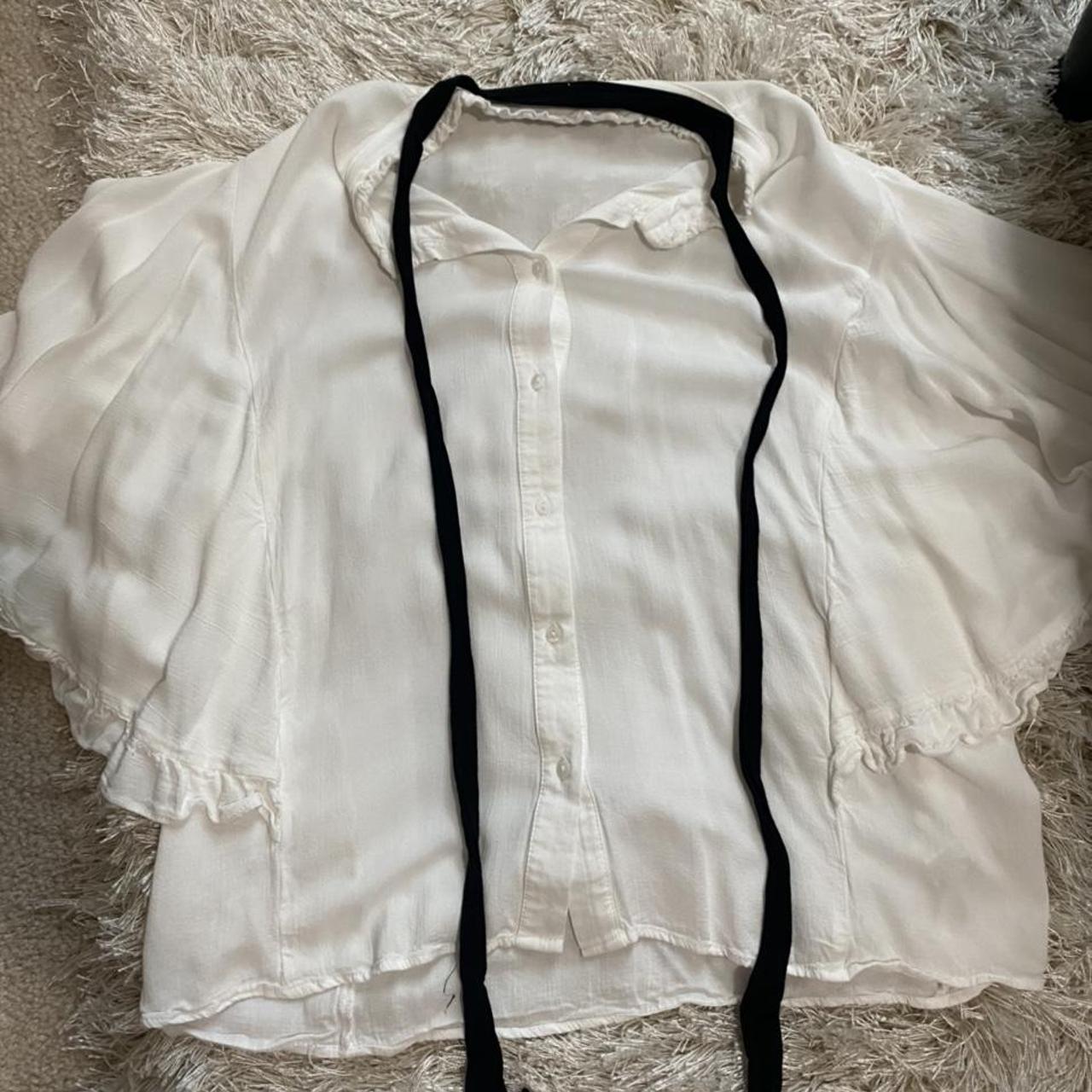 zara white ruffle top with attached black tie worn... Depop