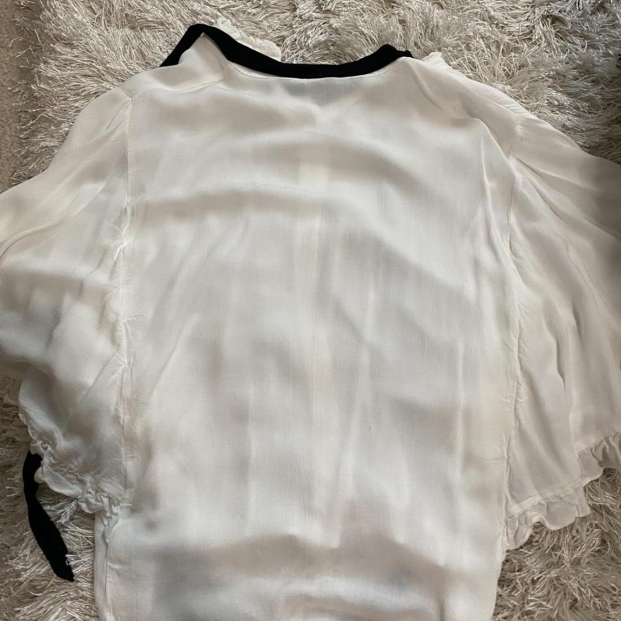 zara white ruffle top with attached black tie worn... Depop