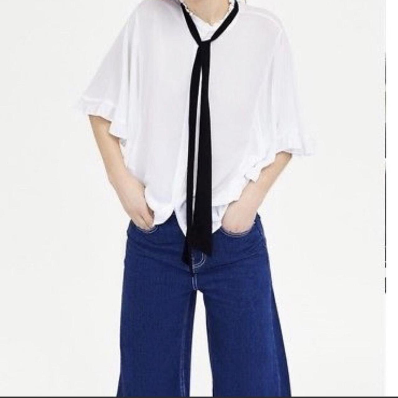 zara white ruffle top with attached black tie worn... Depop