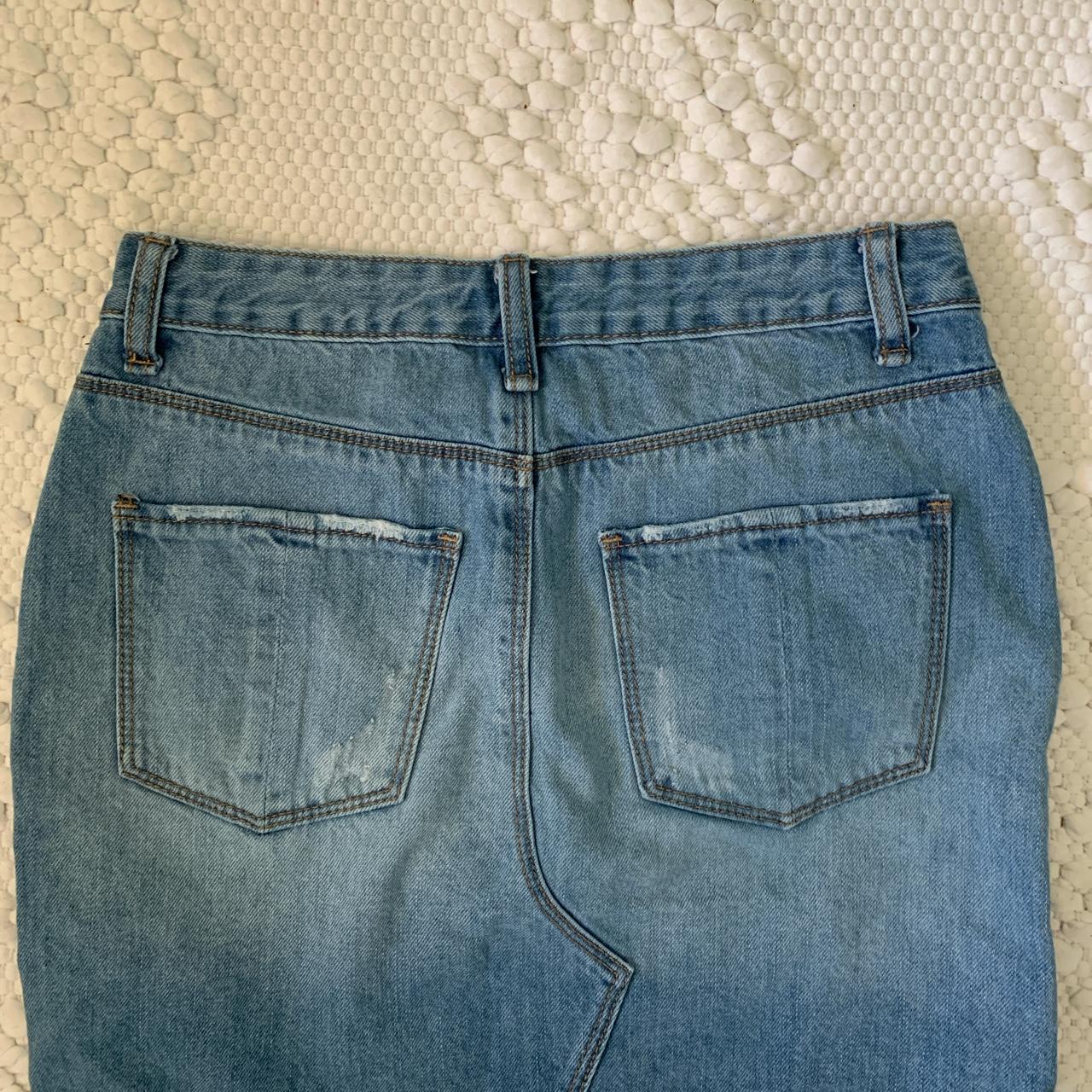 Brandy Melville denim mini skirt. Super cute in good... - Depop