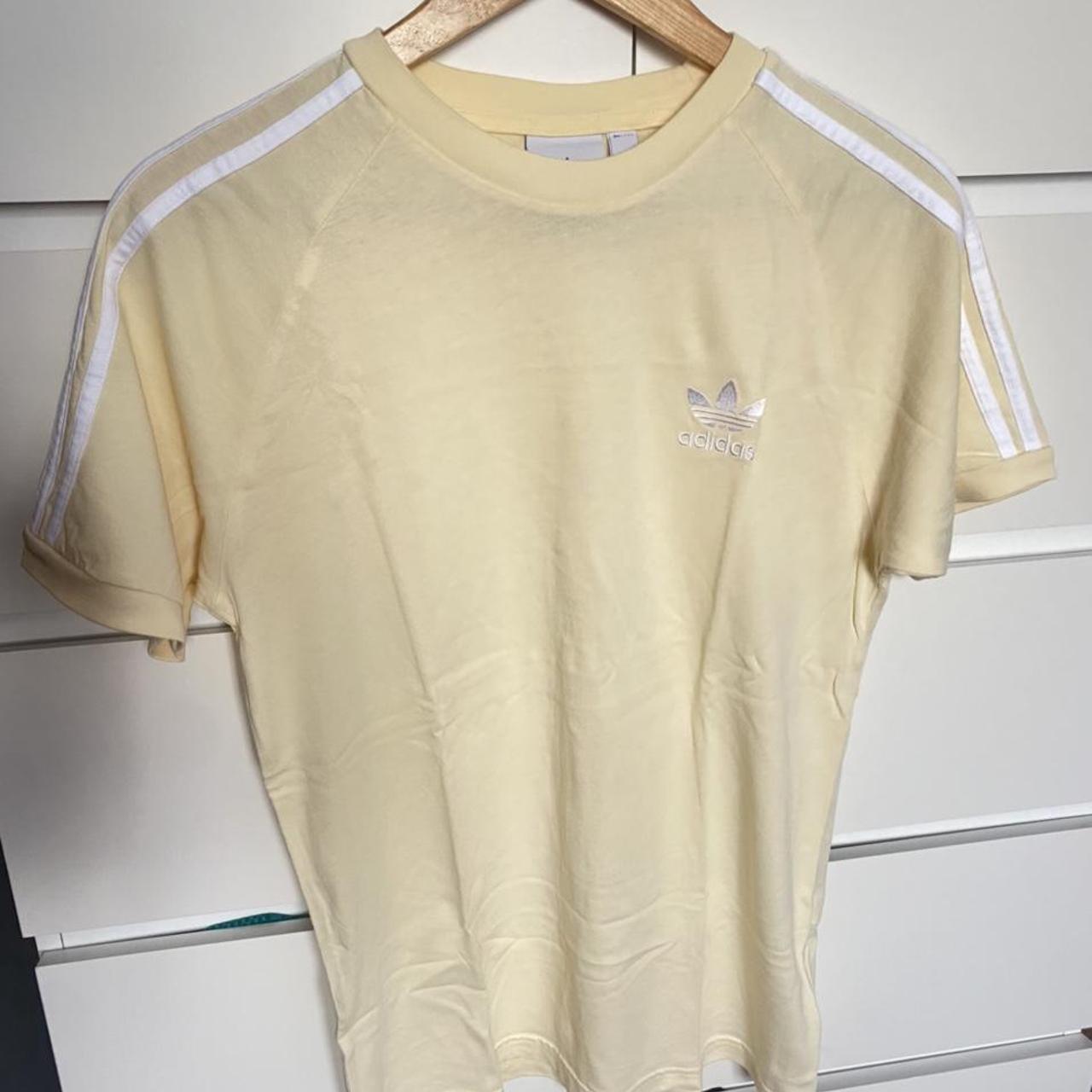 Adidas tshirt in a pastel yellow colour. In such... - Depop