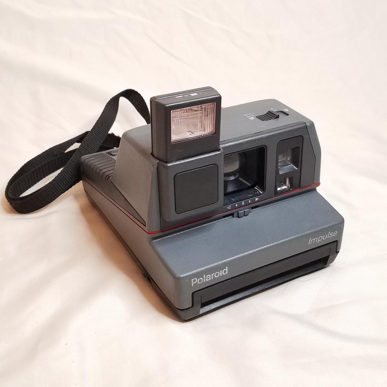 Vintage Polaroid Impulse film camera with neck... Depop
