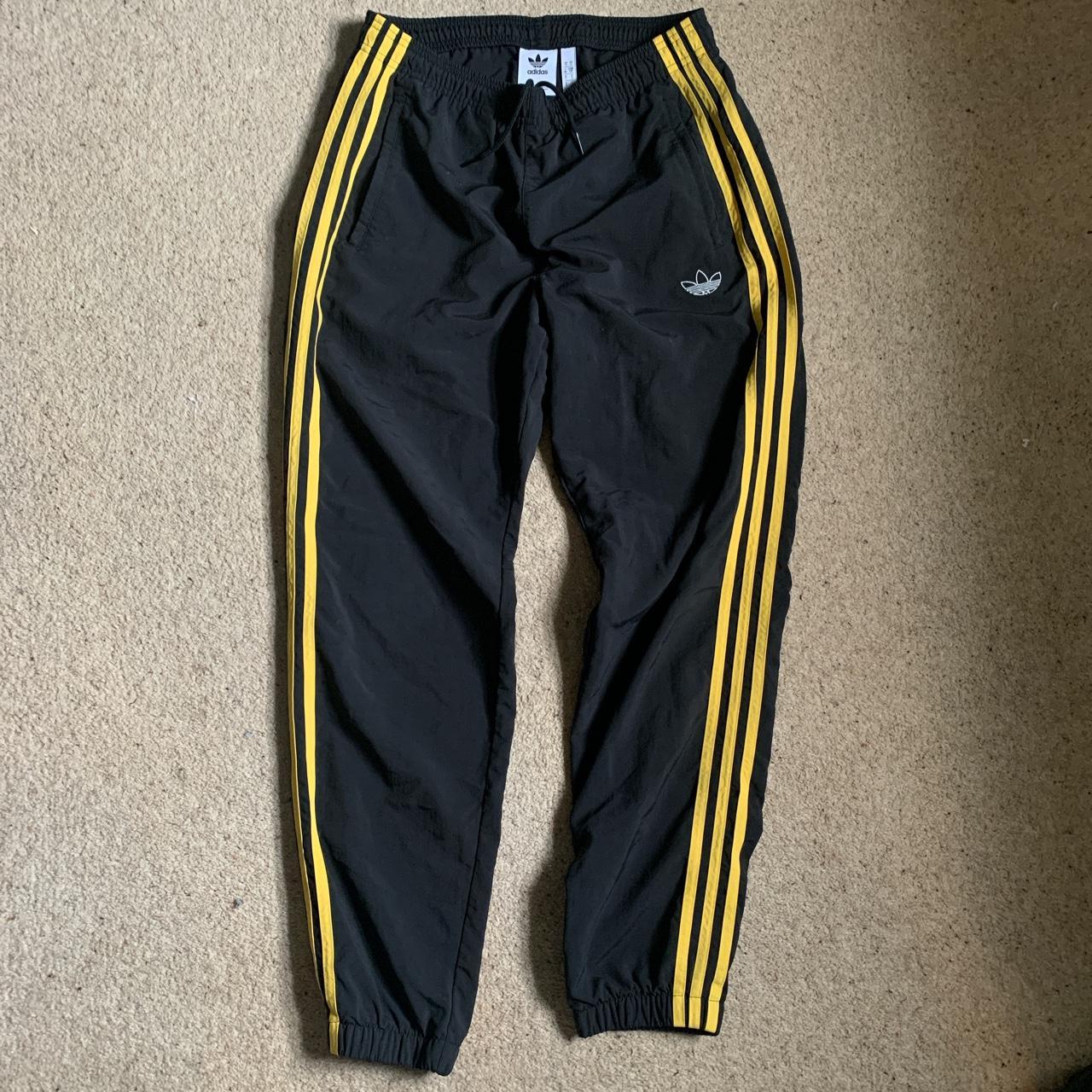 yellow adidas track pants womens