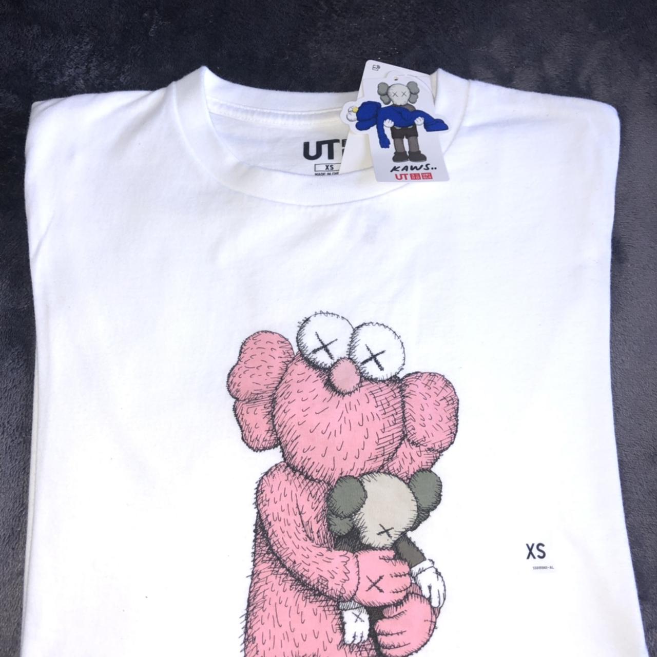 KAWS x UNIQLO Pink BFF Tee White Mens Fashion Tops  Sets Tshirts   Polo Shirts on Carousell