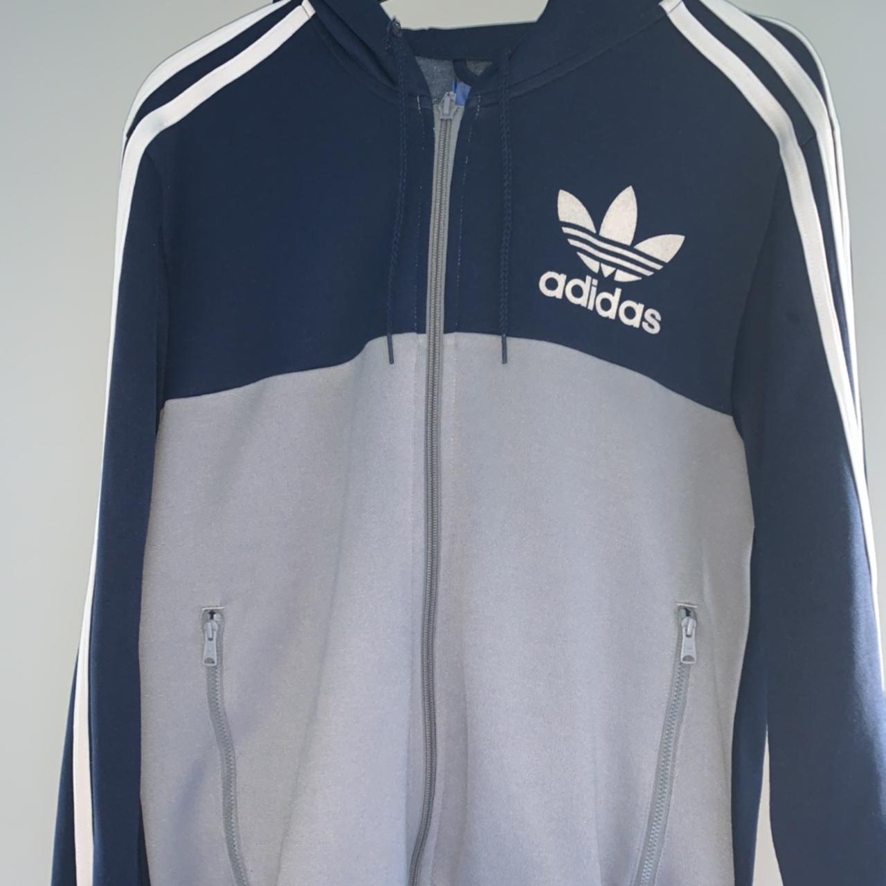 Adidas blue and grey hooded jacket. Worn a couple of... - Depop