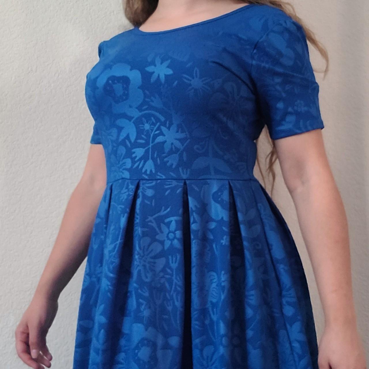 Blue Lularoe dress WITH POCKETS! Has a cute indented... Depop