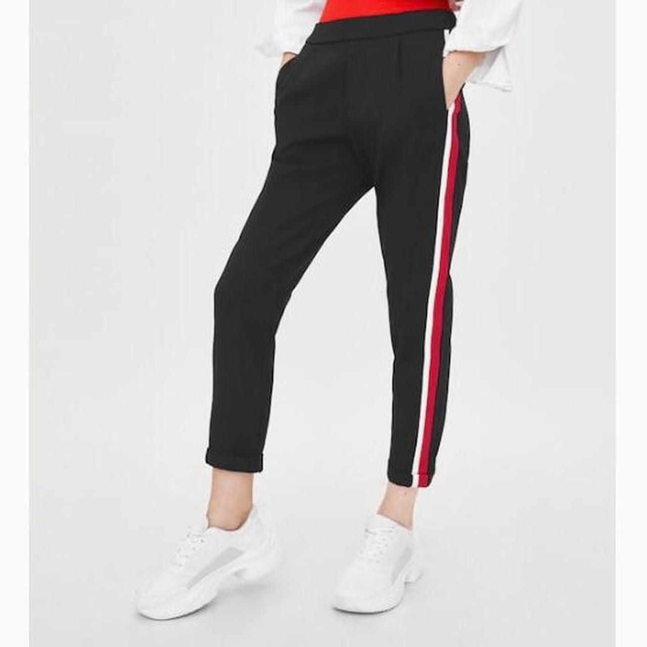 Navy trousers store with red stripe