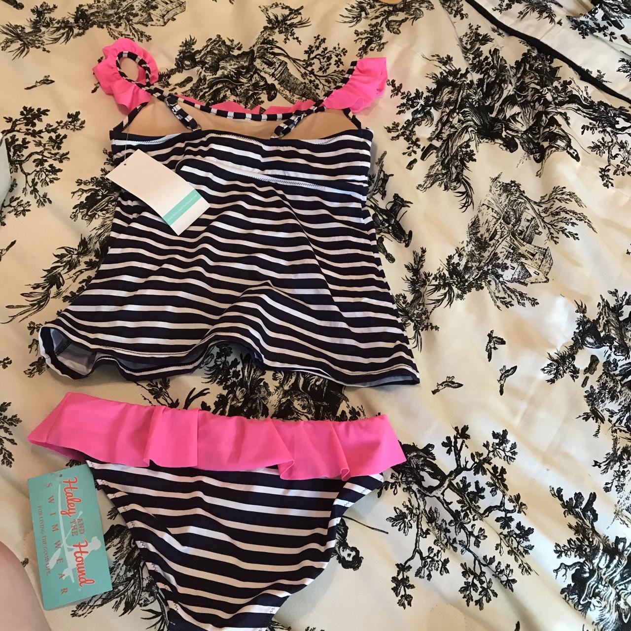 Description super cute tankini. It’s navy and white... Depop