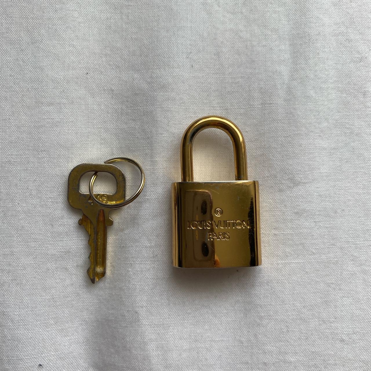 Authentic Louis Vuitton Lock and Key set in very - Depop