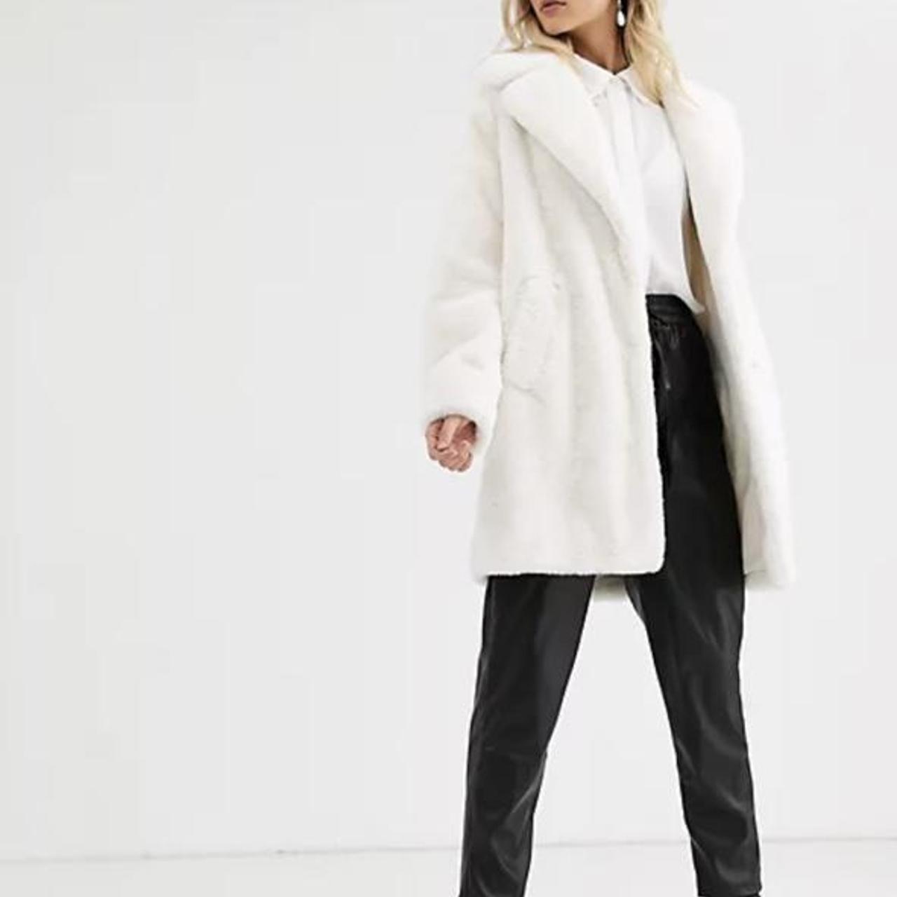 leather jacket over suit