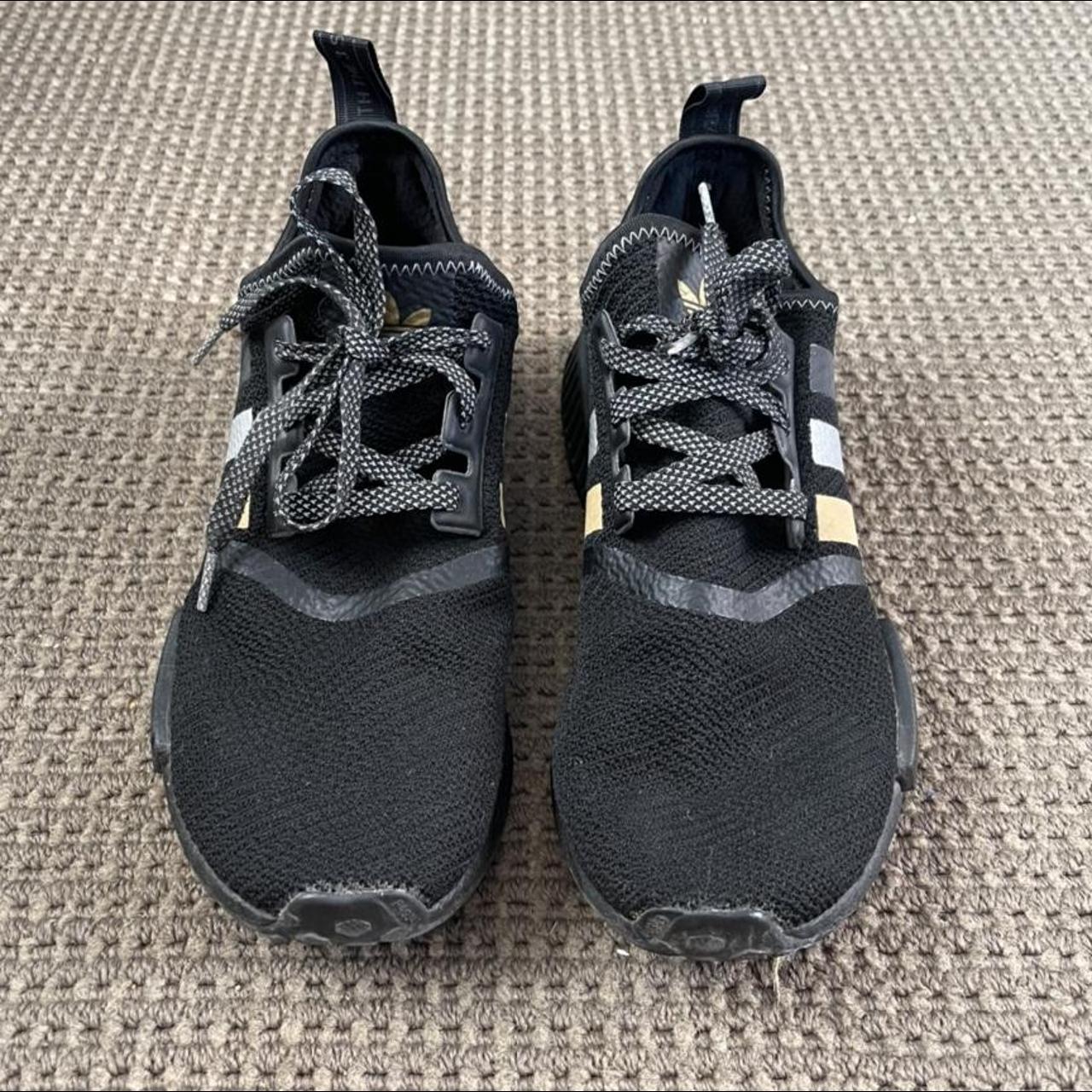 Nmd mens hotsell black and gold