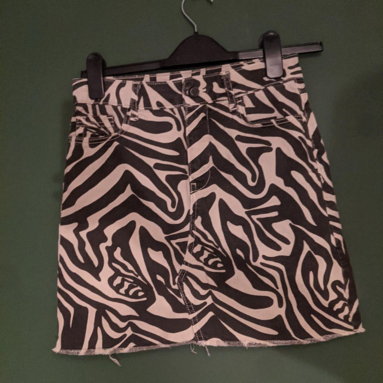 Zara zebra print denim mini skirt with a raw edge,... Depop