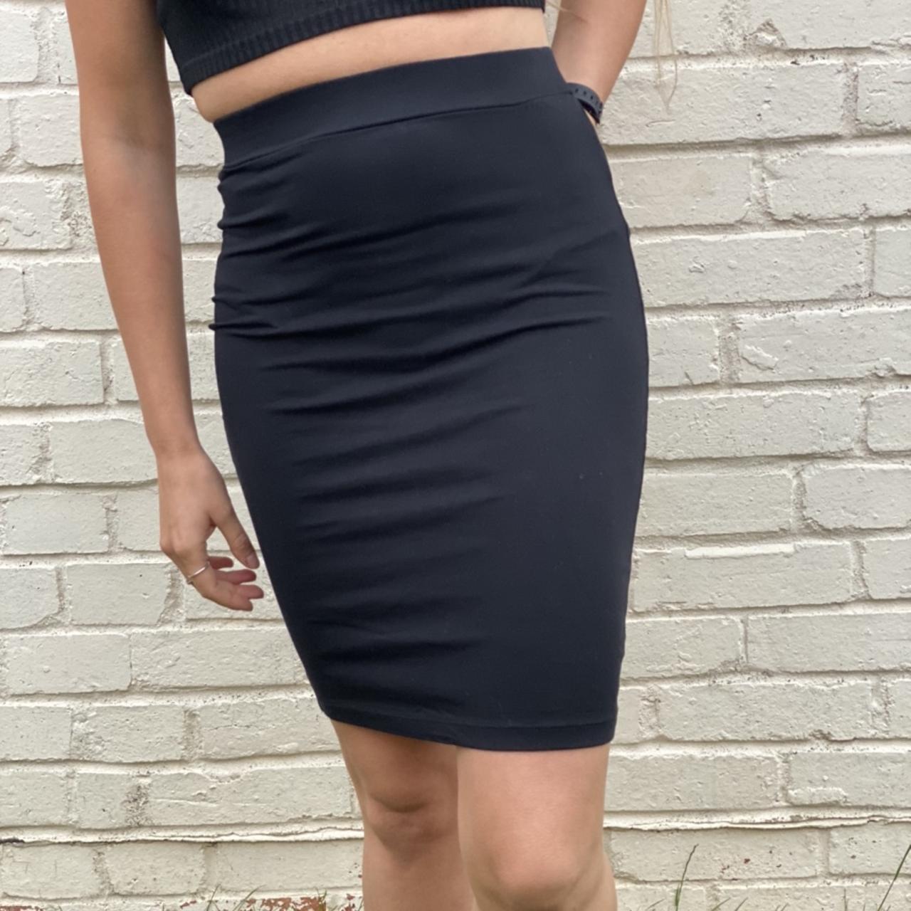 Never worn black midi tight Forever 21 skirt. Very. Depop