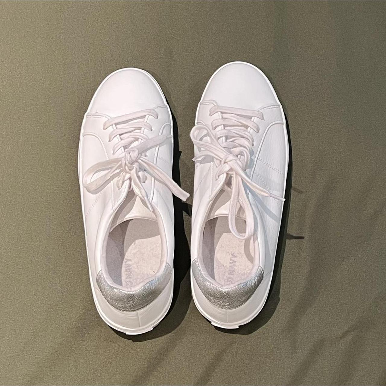 navy and white court shoes