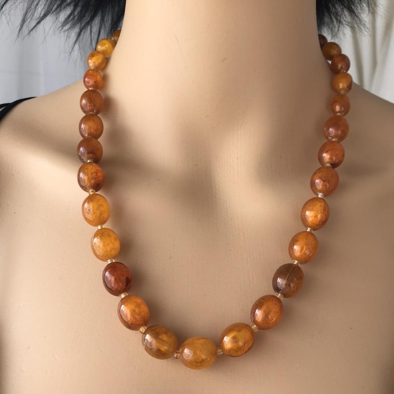 Product Image 1 - A faux amber beads necklace