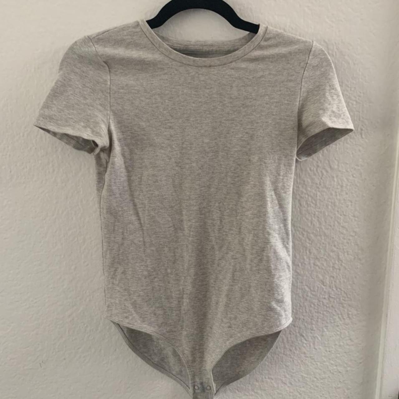 Gap grey body suit!! You can wear this for a super... Depop