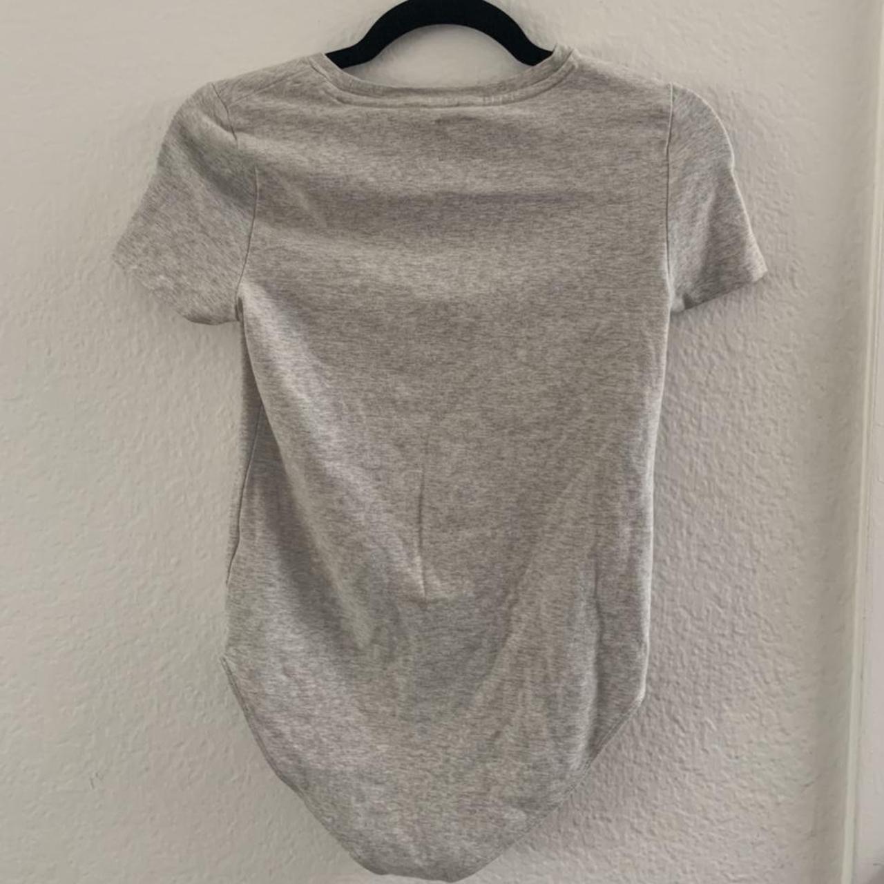 Gap grey body suit!! You can wear this for a super... Depop