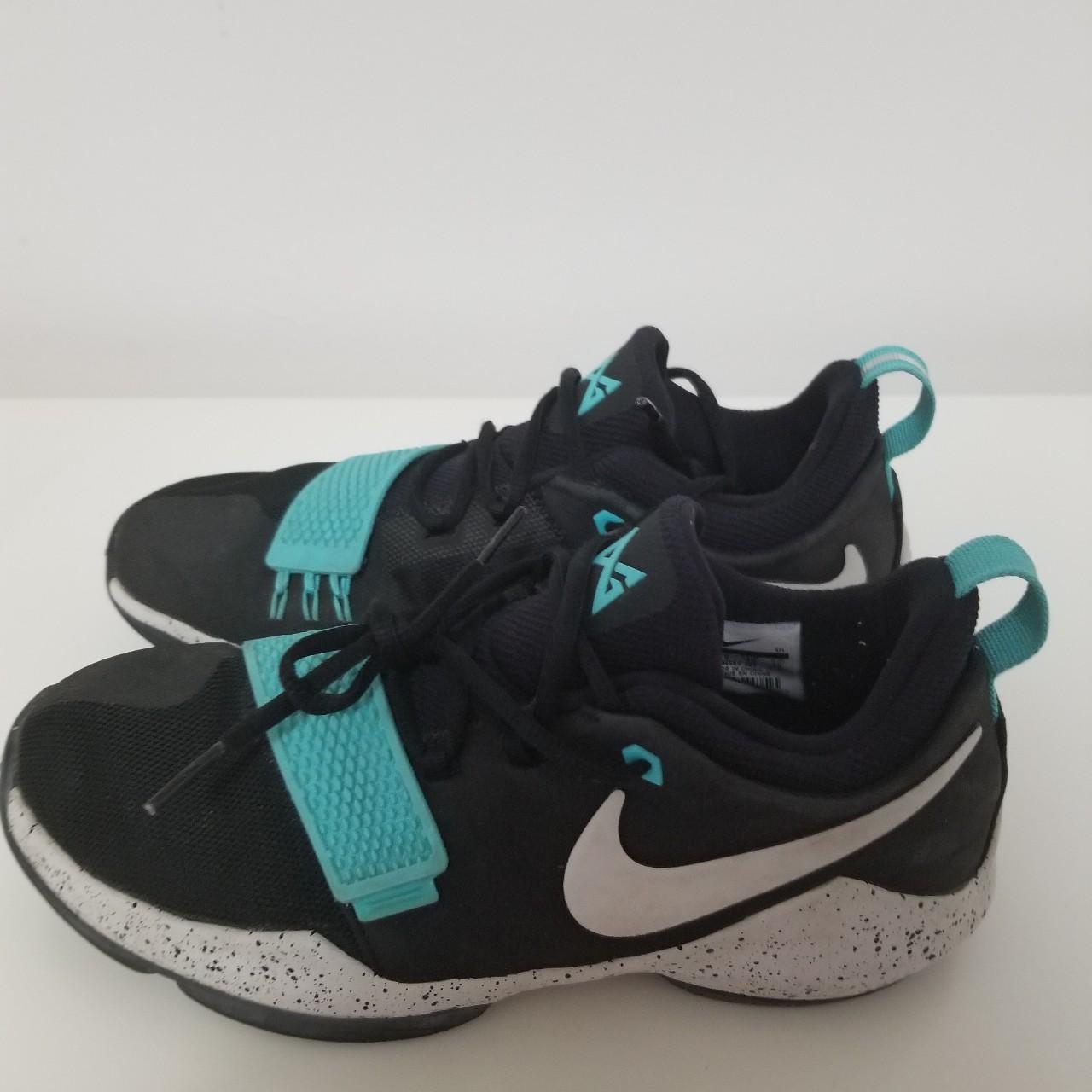Size Nike Paul George 1's in aqua color way,