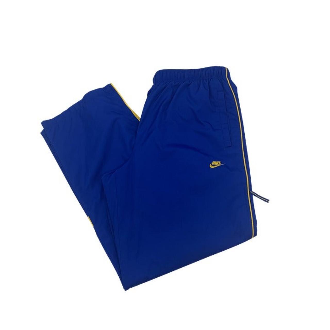 blue and yellow nike joggers