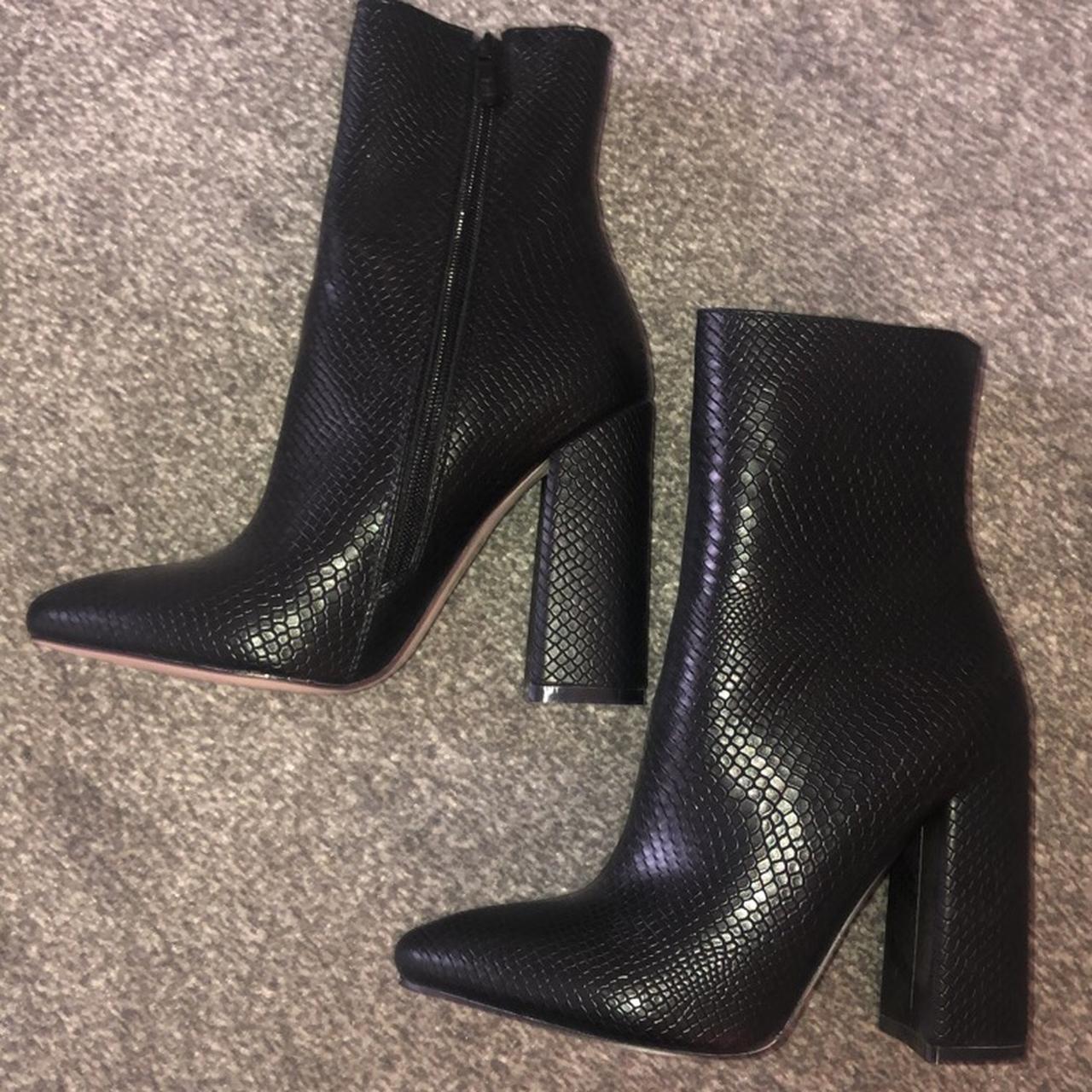 black snakeskin heeled boots