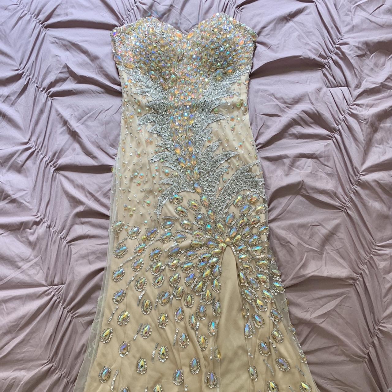 Completely bedazzled nude strapless Angela and... - Depop