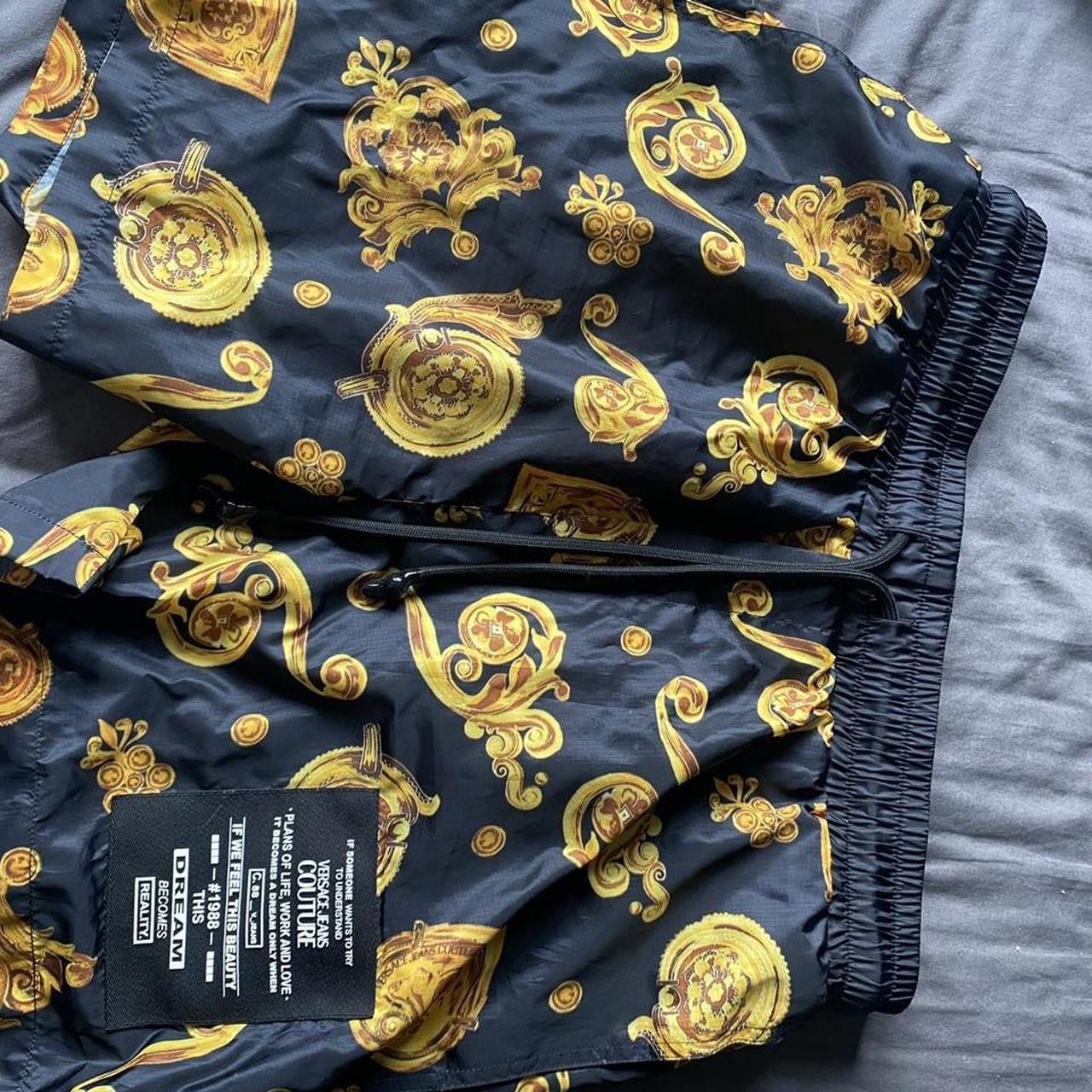 Versace Men's Black and Gold Shorts | Depop