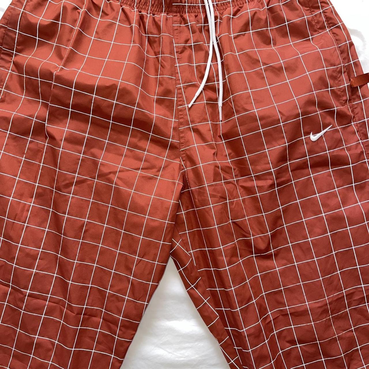 NikeLab Flash Reflective Tracksuit Bottoms Firewood | Depop