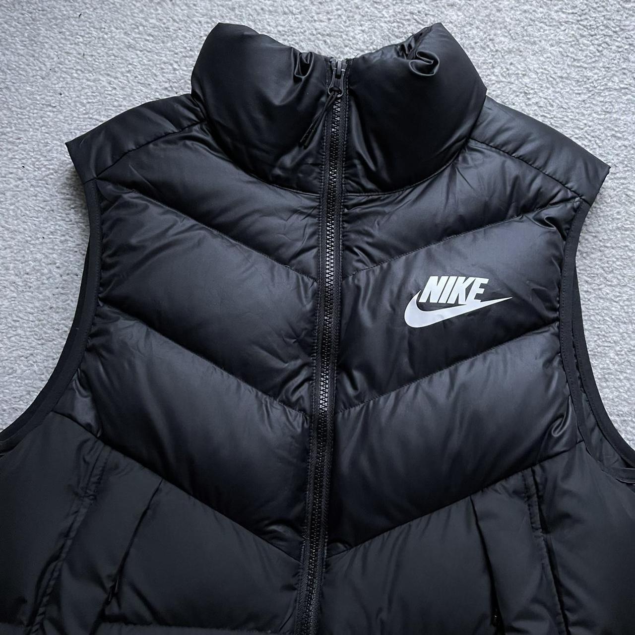 black nike body warmer