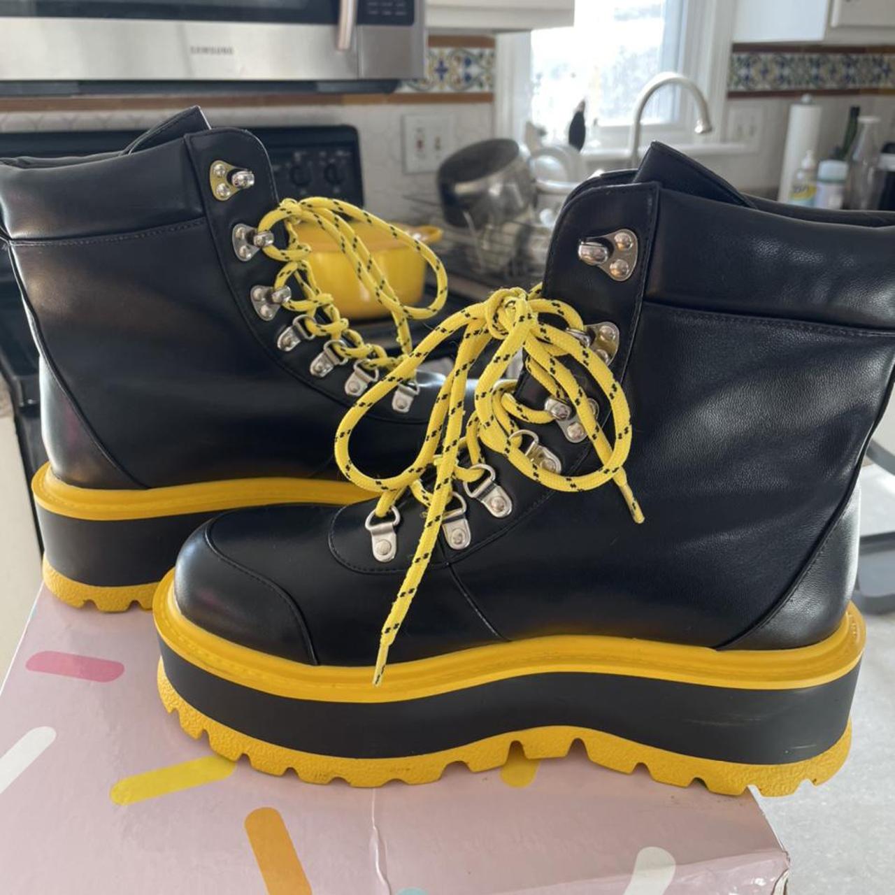 black and yellow platform boots