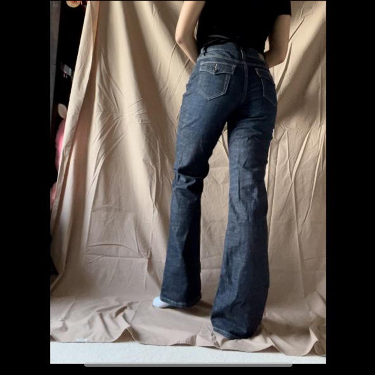 00’s Levi’s dark wash bootcut jeans with cute fold... - Depop